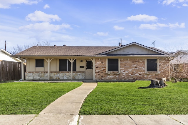 single story home featuring a front yard and a porch