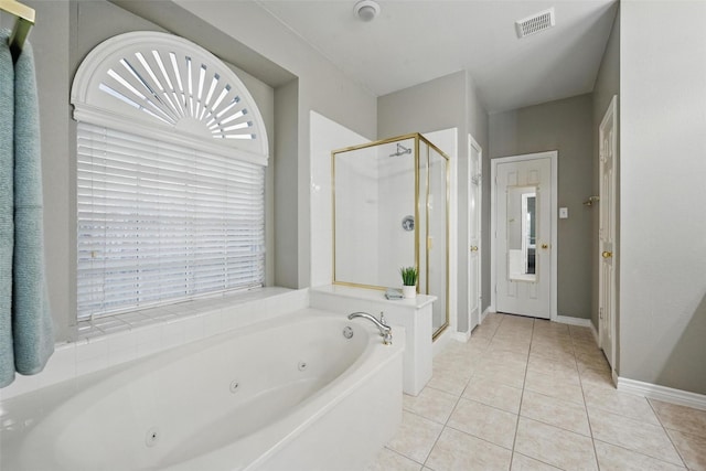 122 Wentwood Dr, Murphy, TX 75094 - bathroom with a shower stall, a jetted tub, and tile patterned floors