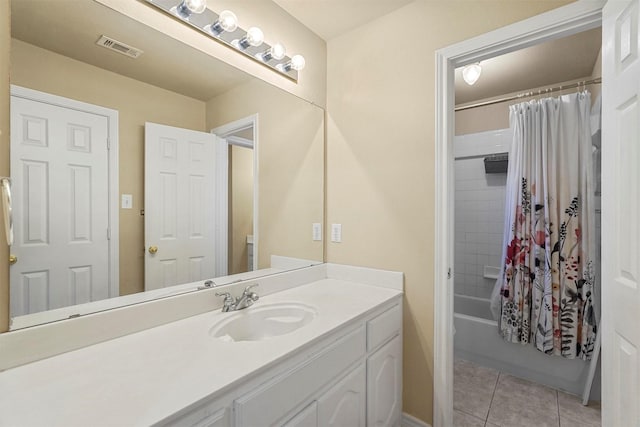 bathroom featuring vanity, tile patterned floors, and shower / tub combo with curtain