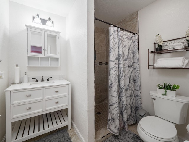 bathroom with a shower with shower curtain, vanity, and toilet