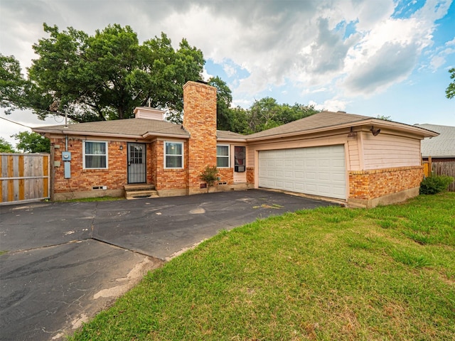 ranch-style home with a garage and a front yard