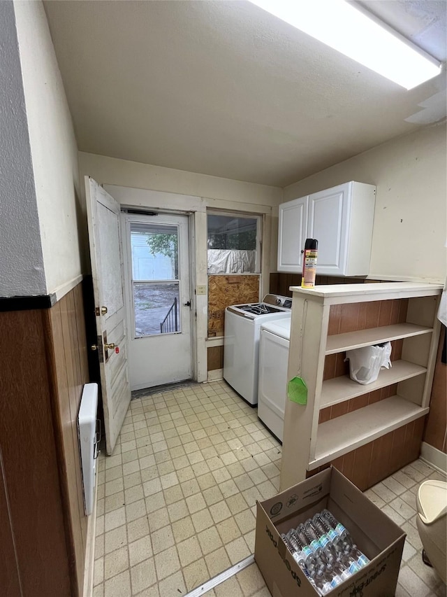 laundry area featuring cabinets and washer and dryer