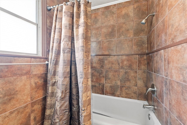 bathroom featuring shower / bath combo