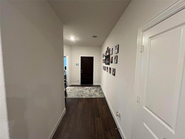 hallway featuring hardwood / wood-style floors