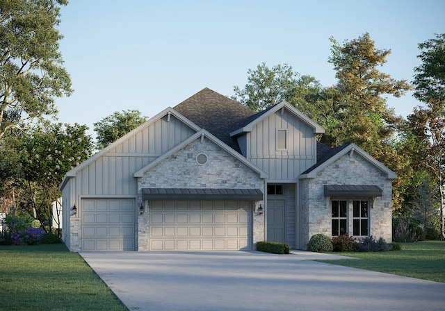 view of front of property featuring a garage and a front yard