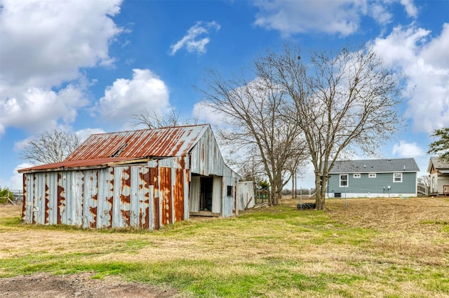 view of outdoor structure with a yard