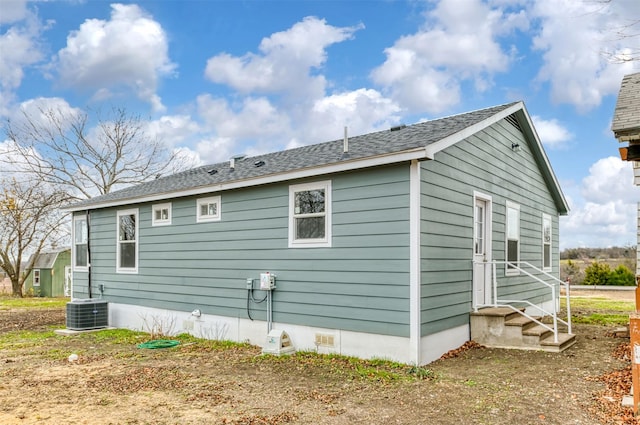 view of side of home with cooling unit