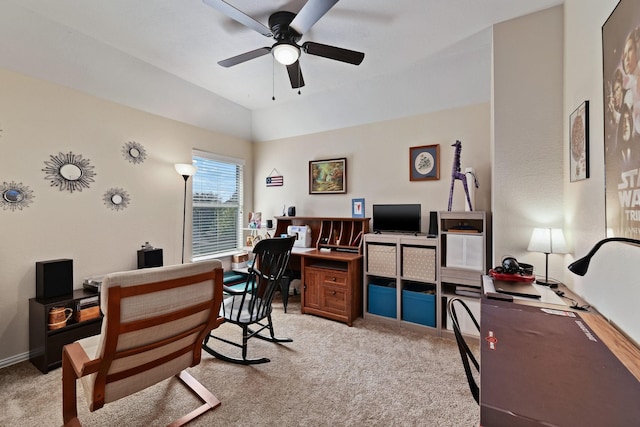 home office featuring light carpet, ceiling fan, and lofted ceiling