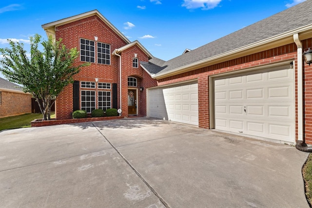 view of property featuring a garage