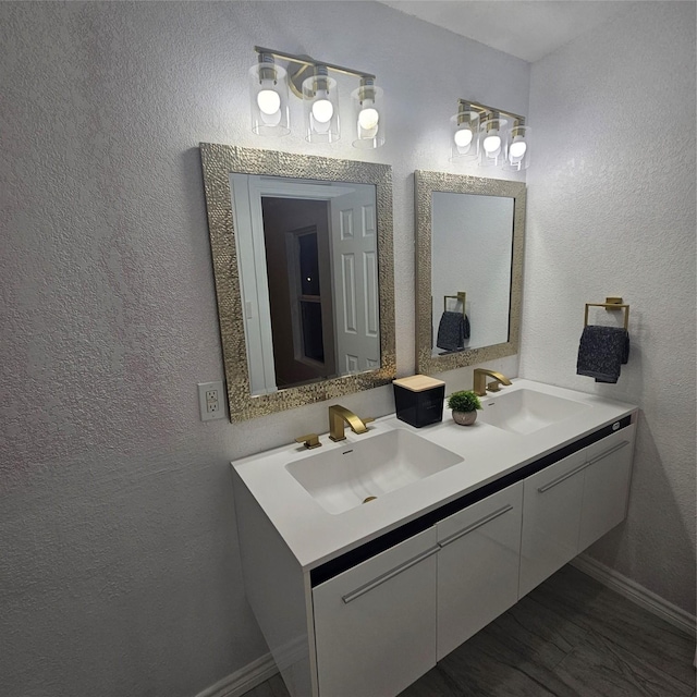 bathroom with vanity and wood-type flooring