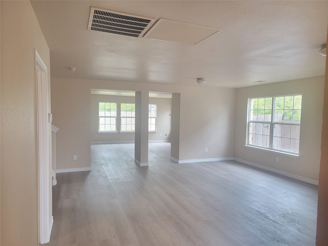 empty room featuring light hardwood / wood-style floors