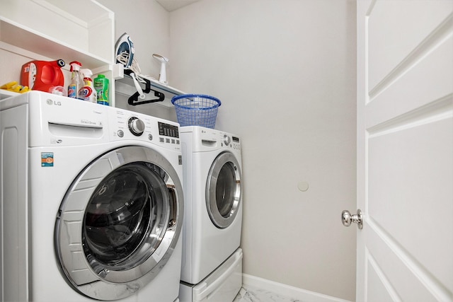 laundry area featuring washer and clothes dryer