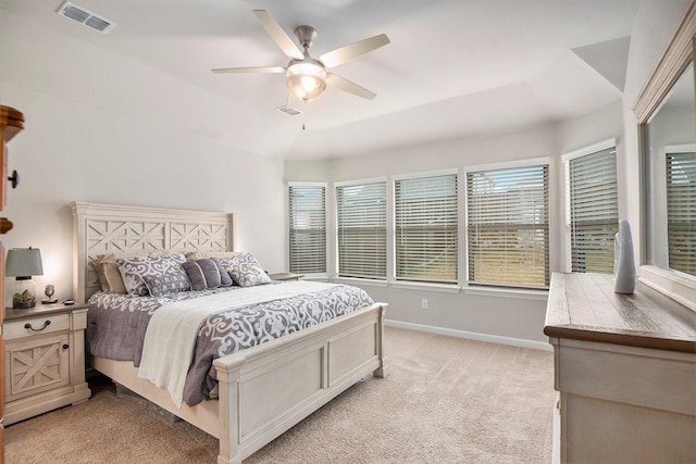 carpeted bedroom with lofted ceiling and ceiling fan