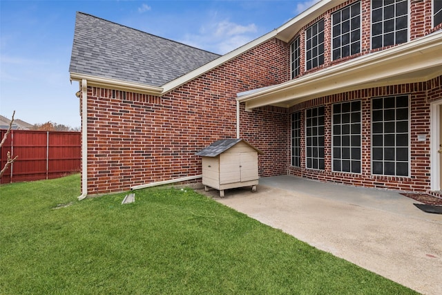 view of patio / terrace featuring a storage shed