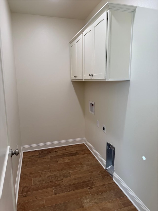 laundry room with cabinets, washer hookup, dark hardwood / wood-style floors, and hookup for an electric dryer