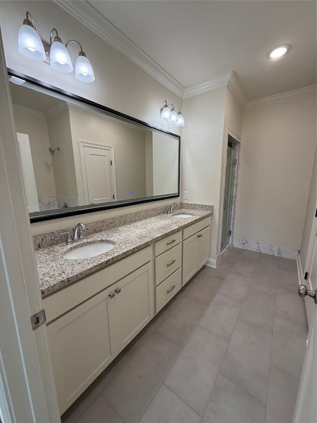 bathroom with vanity, tile patterned floors, ornamental molding, and walk in shower