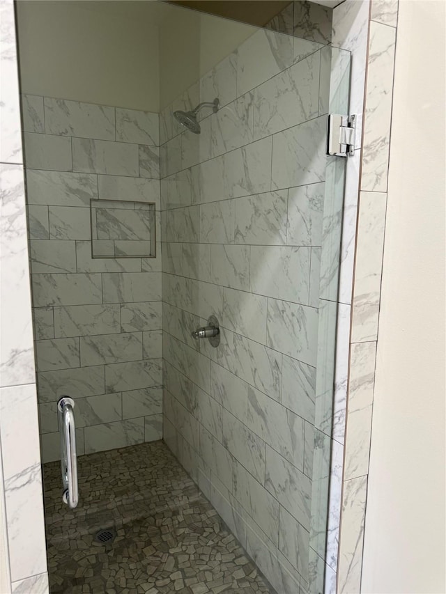 bathroom featuring walk in shower