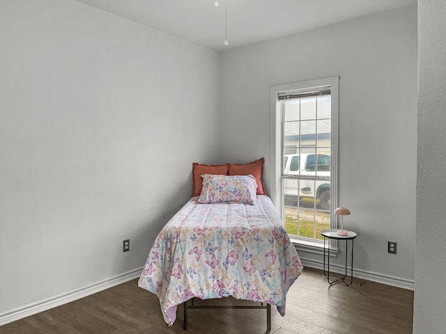 bedroom featuring hardwood / wood-style flooring