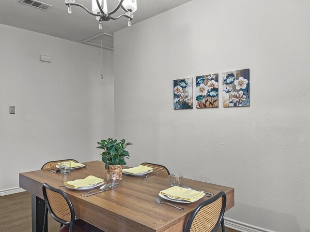 dining area with dark wood-type flooring