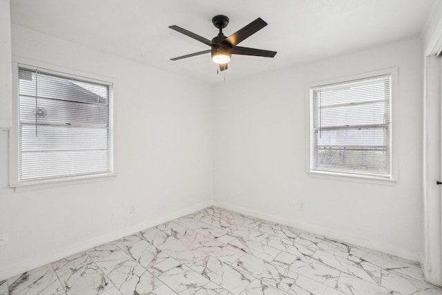 unfurnished room with ceiling fan