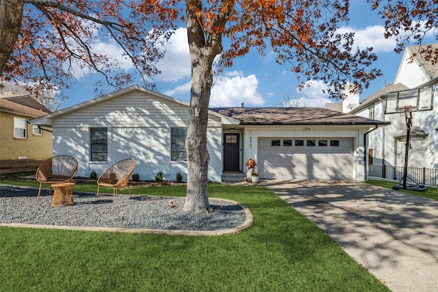 single story home featuring a front yard and a garage