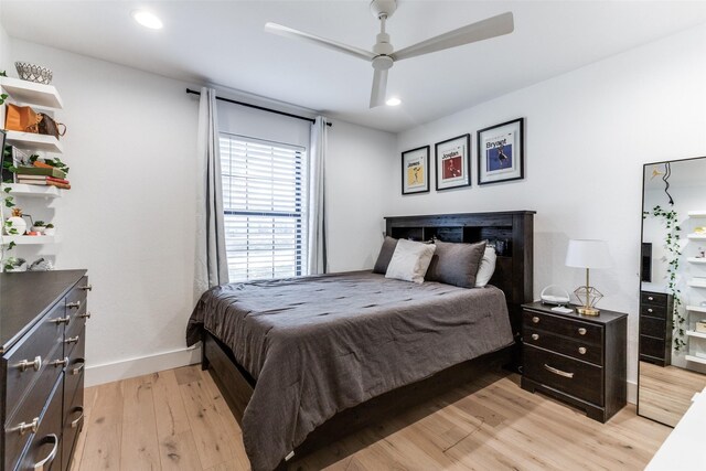 bedroom with light wood-type flooring and ceiling fan