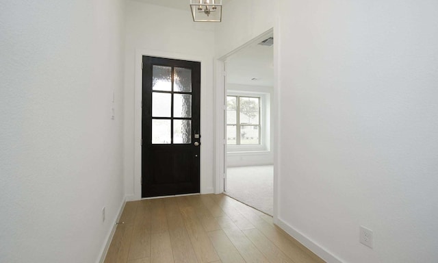 doorway featuring light wood-type flooring