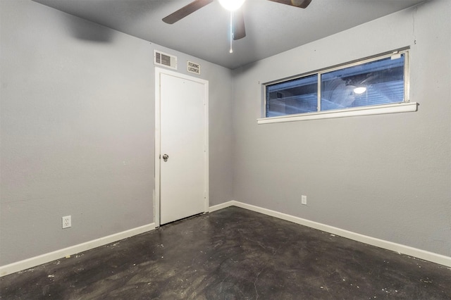 spare room with ceiling fan