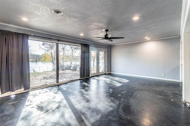 spare room with ceiling fan, french doors, crown molding, a textured ceiling, and a water view