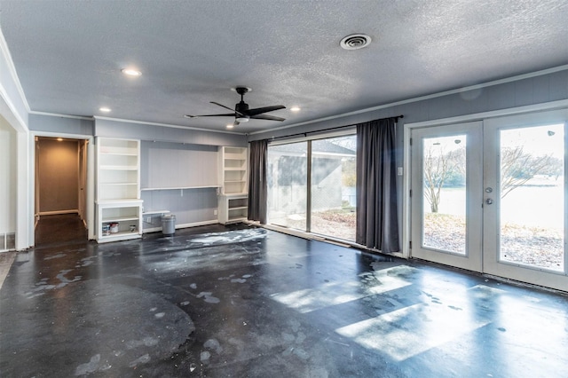 unfurnished living room with french doors, a textured ceiling, and ceiling fan