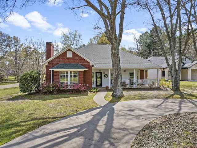 view of front of home with a porch and a front lawn