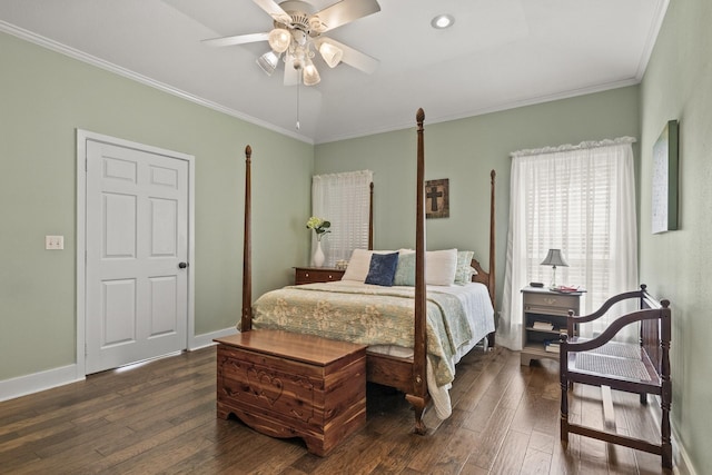 bedroom featuring ornamental molding, ceiling fan, and dark hardwood / wood-style flooring