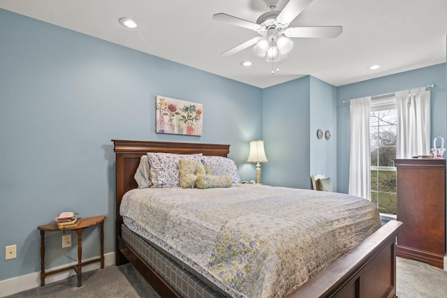 carpeted bedroom with ceiling fan