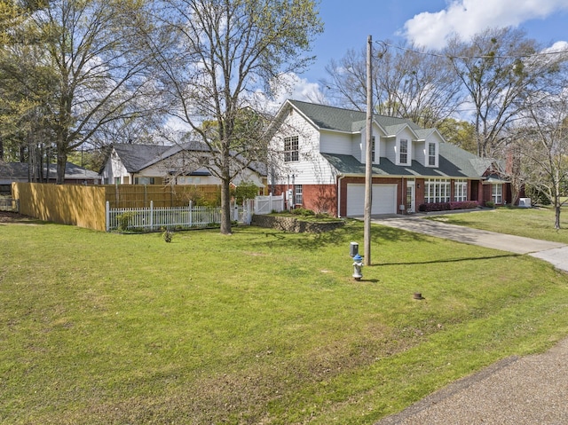 exterior space featuring a garage and a yard