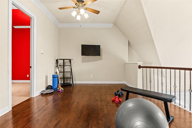 workout area featuring crown molding, hardwood / wood-style floors, ceiling fan, and vaulted ceiling