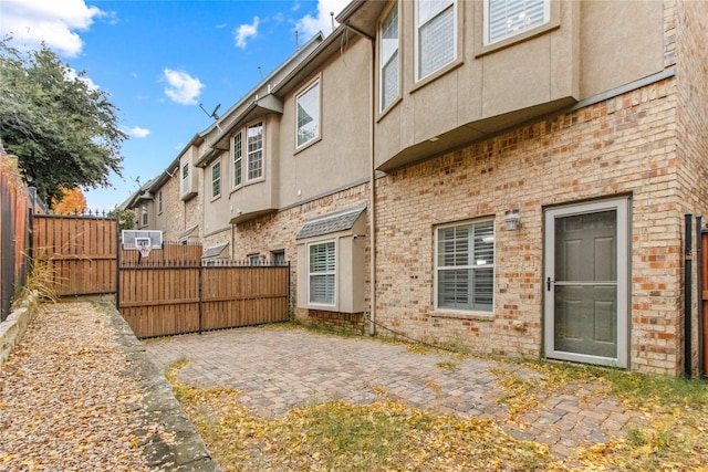 rear view of property with a patio area