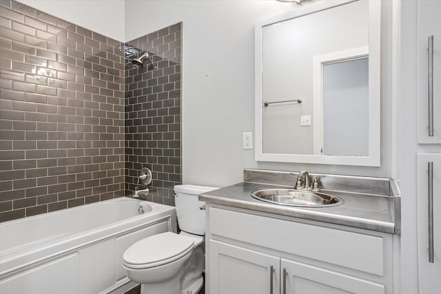 bathroom featuring shower / bathing tub combination, vanity, and toilet