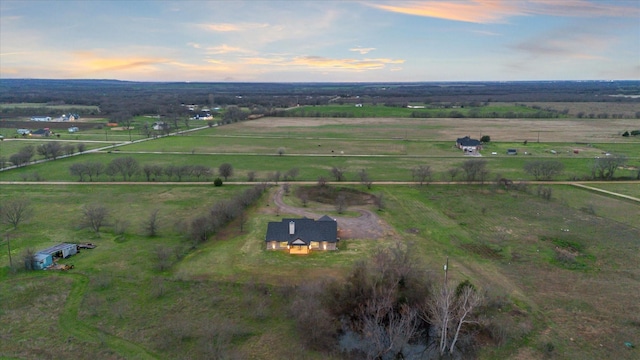 aerial view at dusk with a rural view