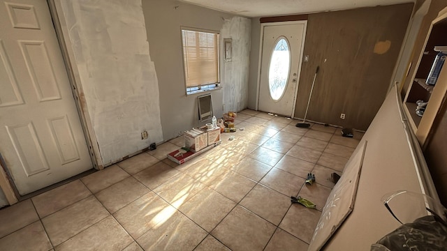 foyer featuring light tile patterned flooring