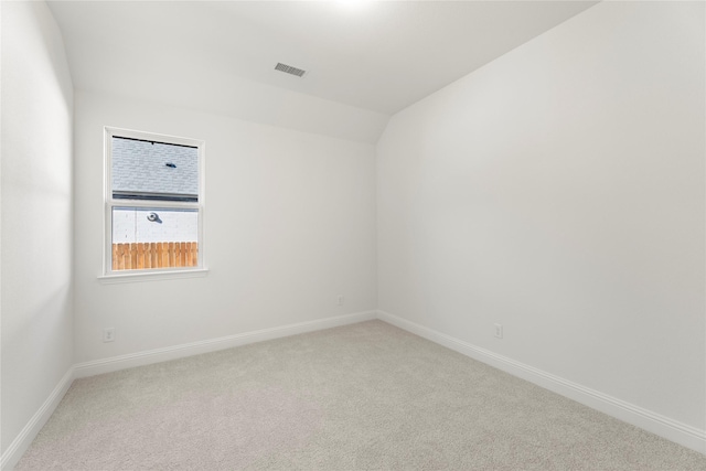 unfurnished room with carpet flooring