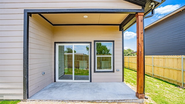 doorway to property featuring a patio