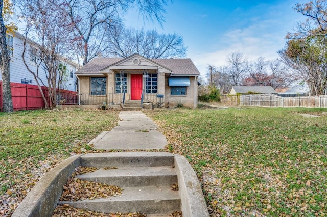 view of front facade with a front yard