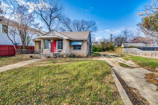 view of front of home with a front lawn