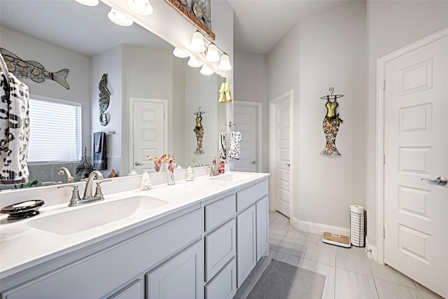 bathroom featuring tile patterned floors and vanity