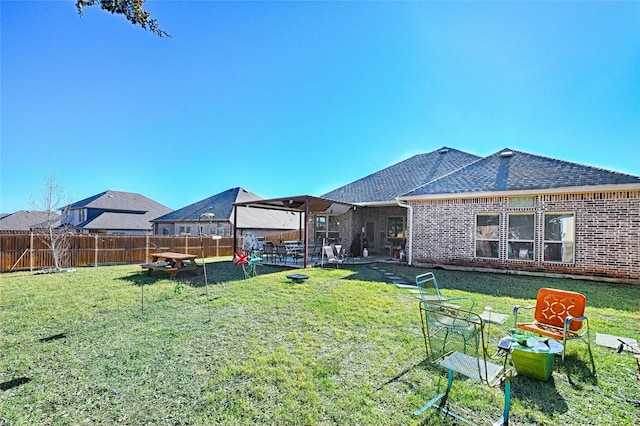 view of yard with a patio and a fenced backyard