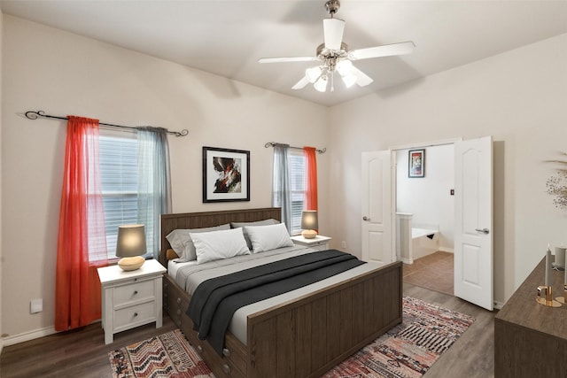 bedroom with multiple windows, dark hardwood / wood-style floors, and ceiling fan