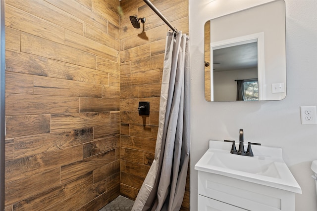 bathroom with vanity and walk in shower