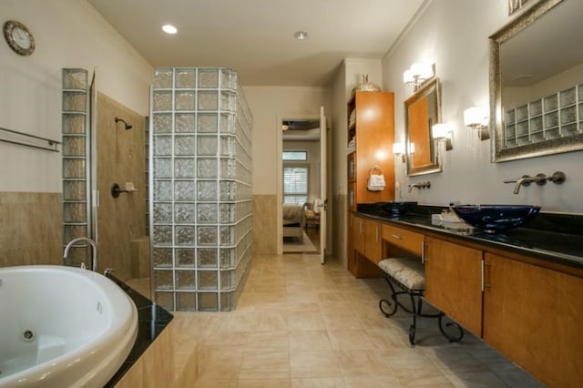 1218 Hunters Haven Dr, Kennedale, TX 76060 - bathroom featuring a whirlpool tub, a walk in shower, crown molding, vanity, and tile patterned flooring