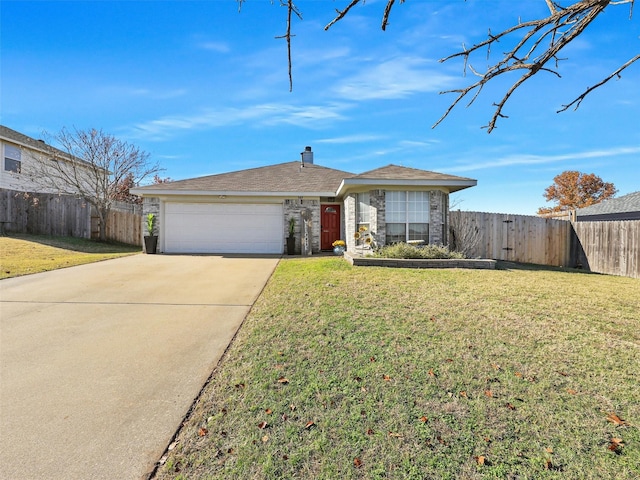 ranch-style home featuring a garage and a front lawn