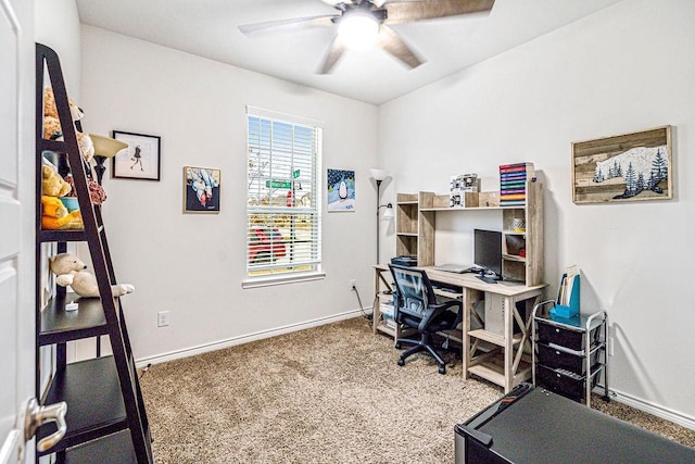 home office featuring ceiling fan and carpet